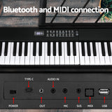 Portable 61-Key Digital Piano Keyboard with Bluetooth and Accessories