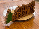 Wooden carved Merry Christmas decoration 38 cm long with Tree and Star