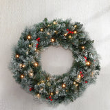 Jingle Jollys 60cm Illuminated Snow-Frosted Christmas Wreath with Red Berry Accents