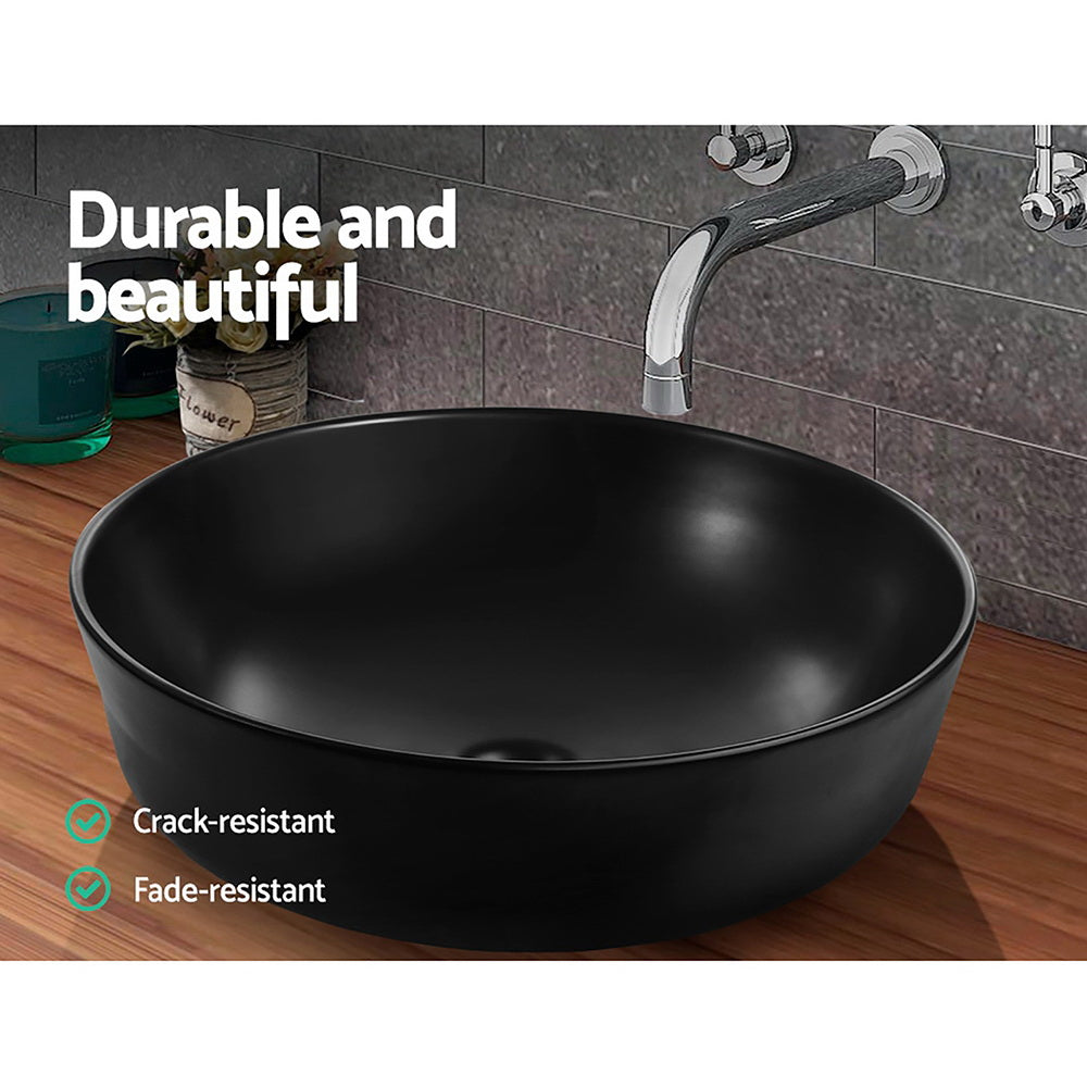 Sleek Matte Black Oval Ceramic Vanity Sink for Above-Counter Installation