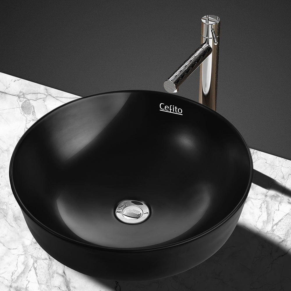 Sleek Matte Black Oval Ceramic Vanity Sink for Above-Counter Installation